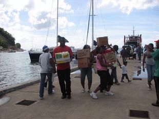 Image #31 - Hurricane Tomas Relief Effort (Carrying the goods to the distribution point)